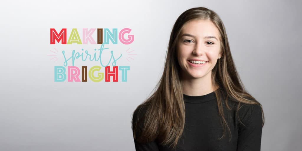 girl with brown hair next to text that says, "making spirits bright"