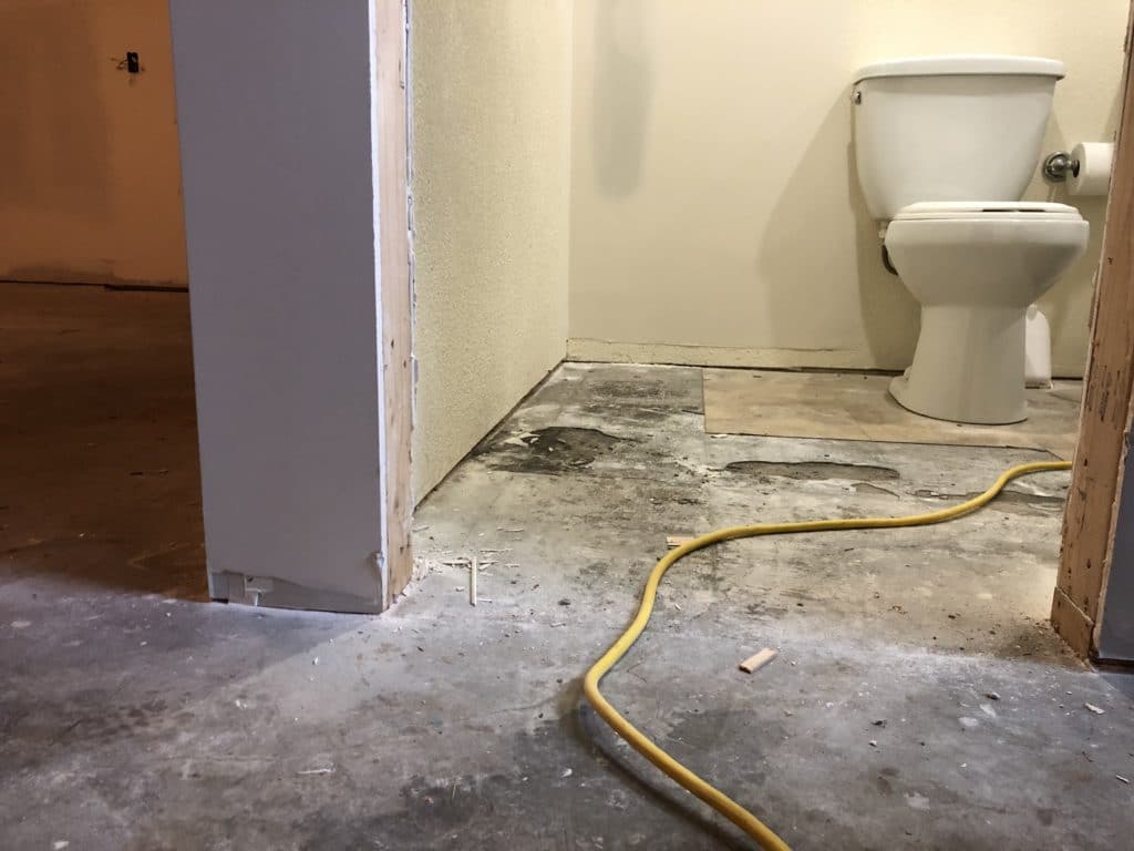 photo of an unfinished bathroom with just the toilet