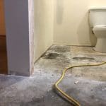 photo of an unfinished bathroom with just the toilet
