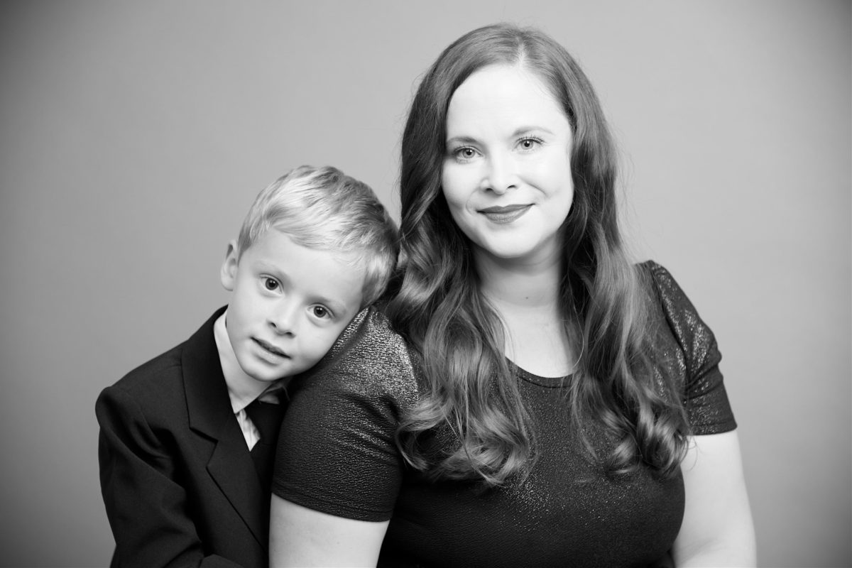 black and white photo of a mom and her son in formalwear