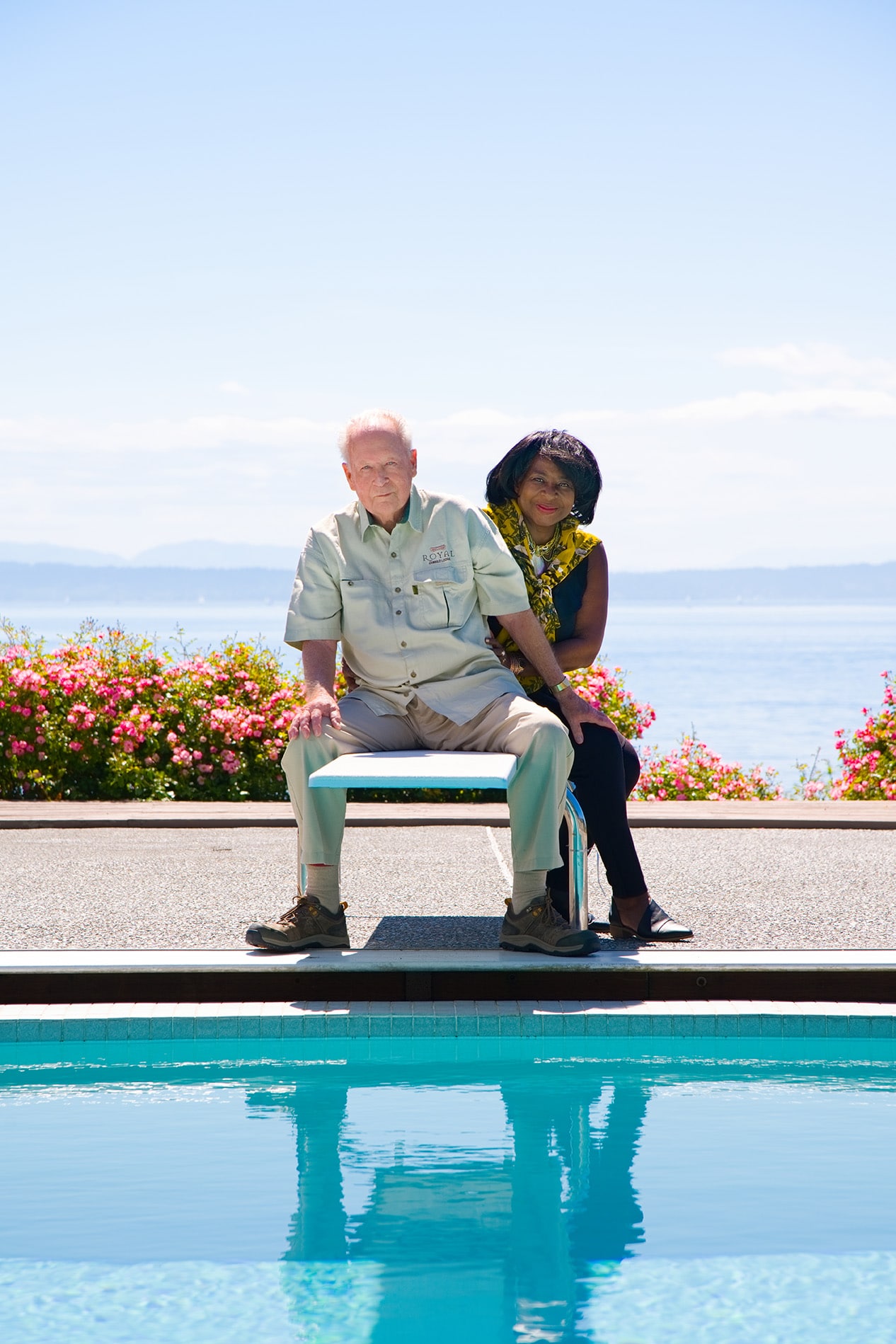 outdoor photo of elderly couple on a diving board