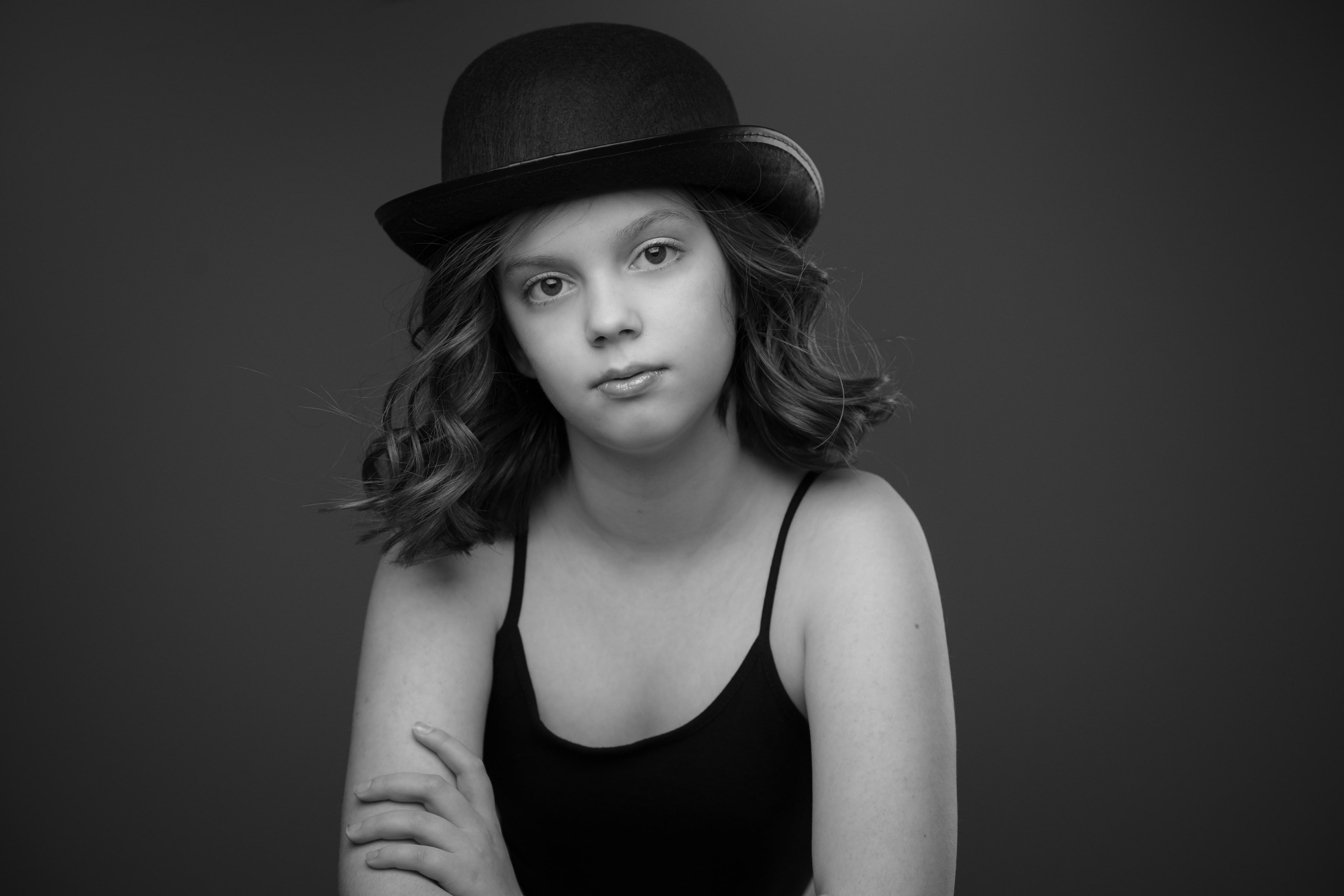 Photo of a girl wearing bowler hat