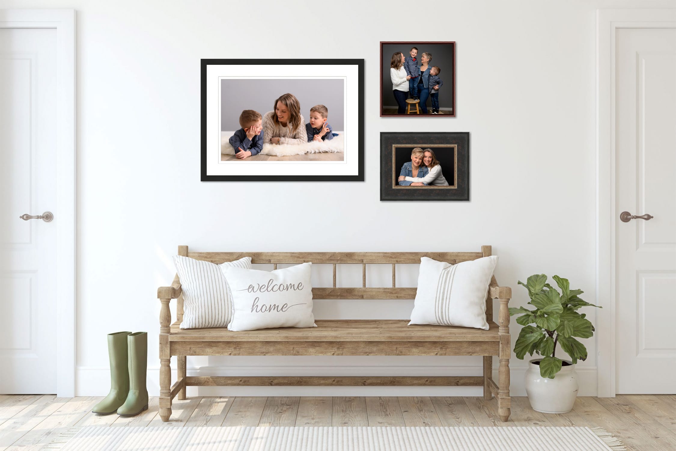 family portrait gallery on the wall in entryway