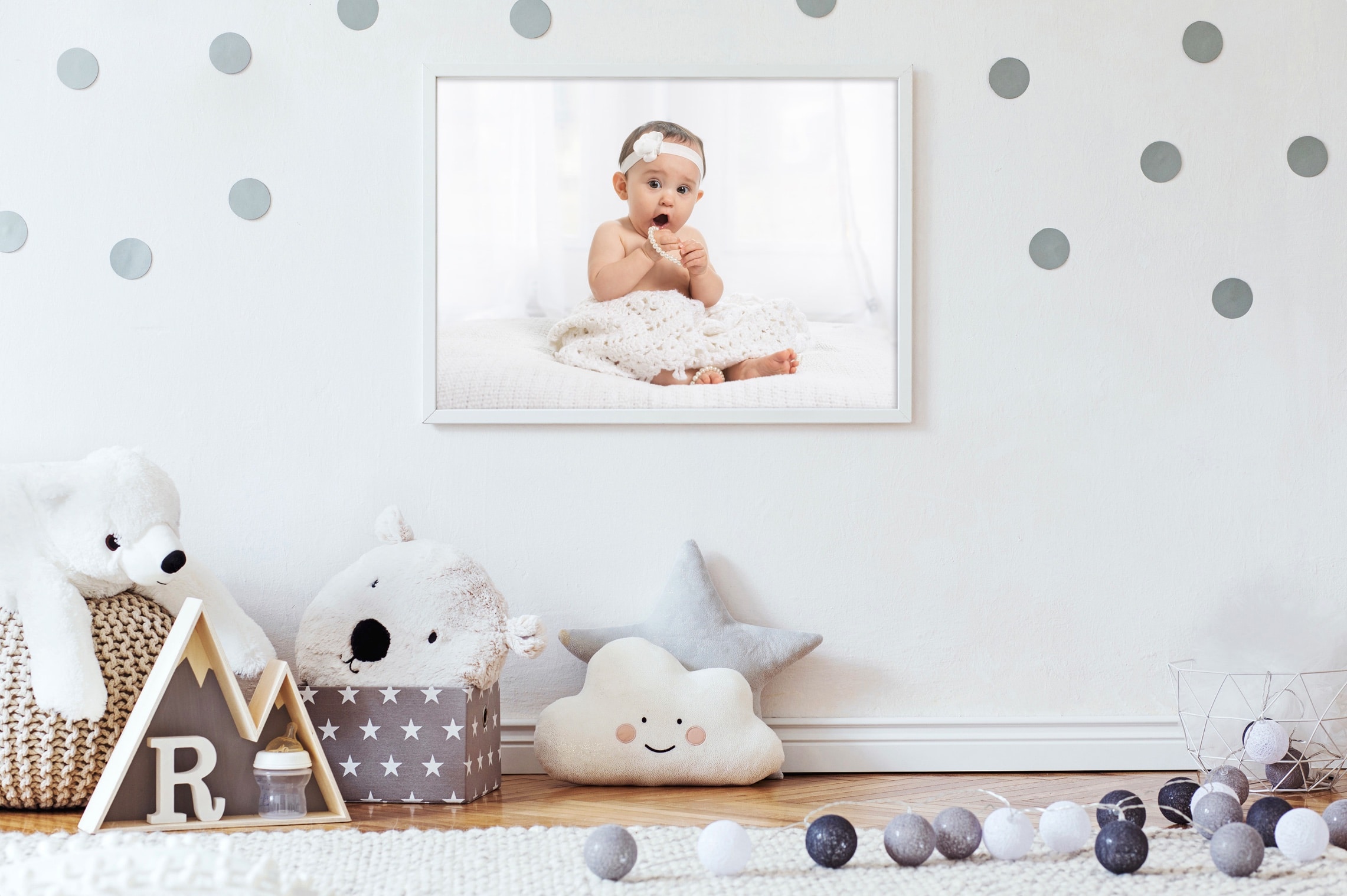Portrait of a baby hanging on the wall in a kid's room