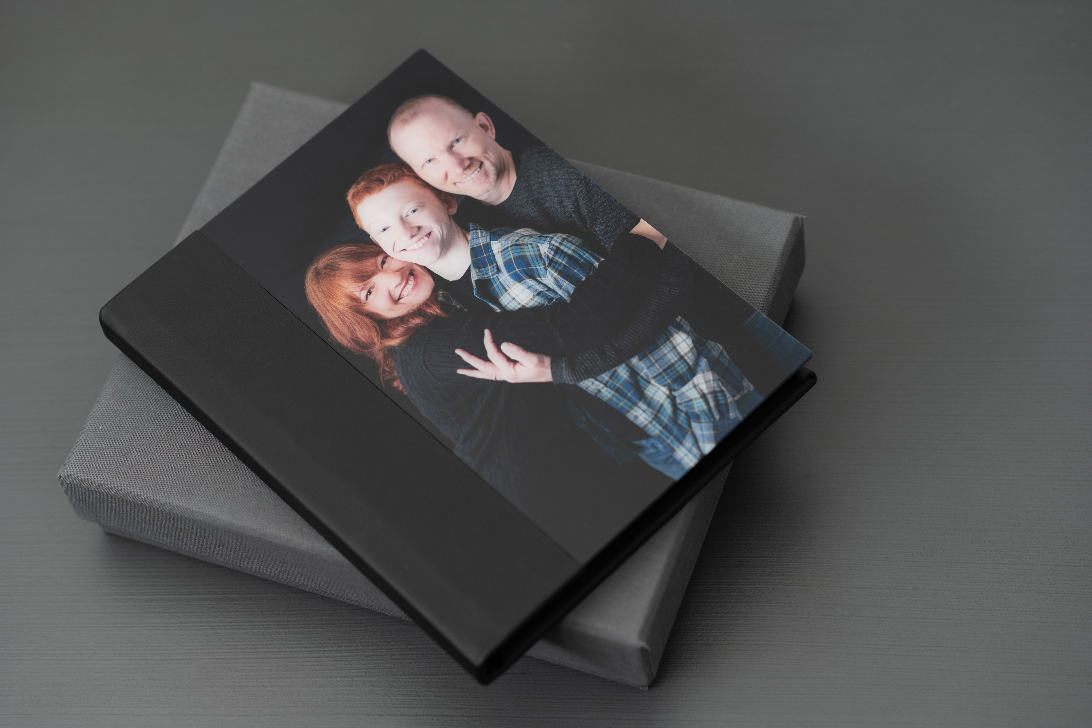 Family photo album sitting on box