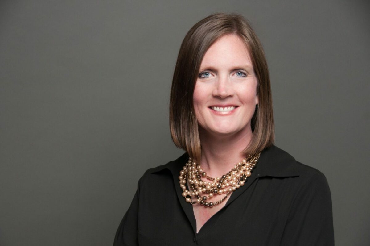 Woman posing for a headshot photo.