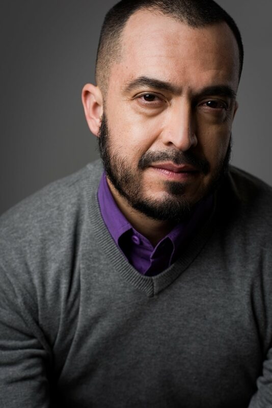 Man posing for studio headshot