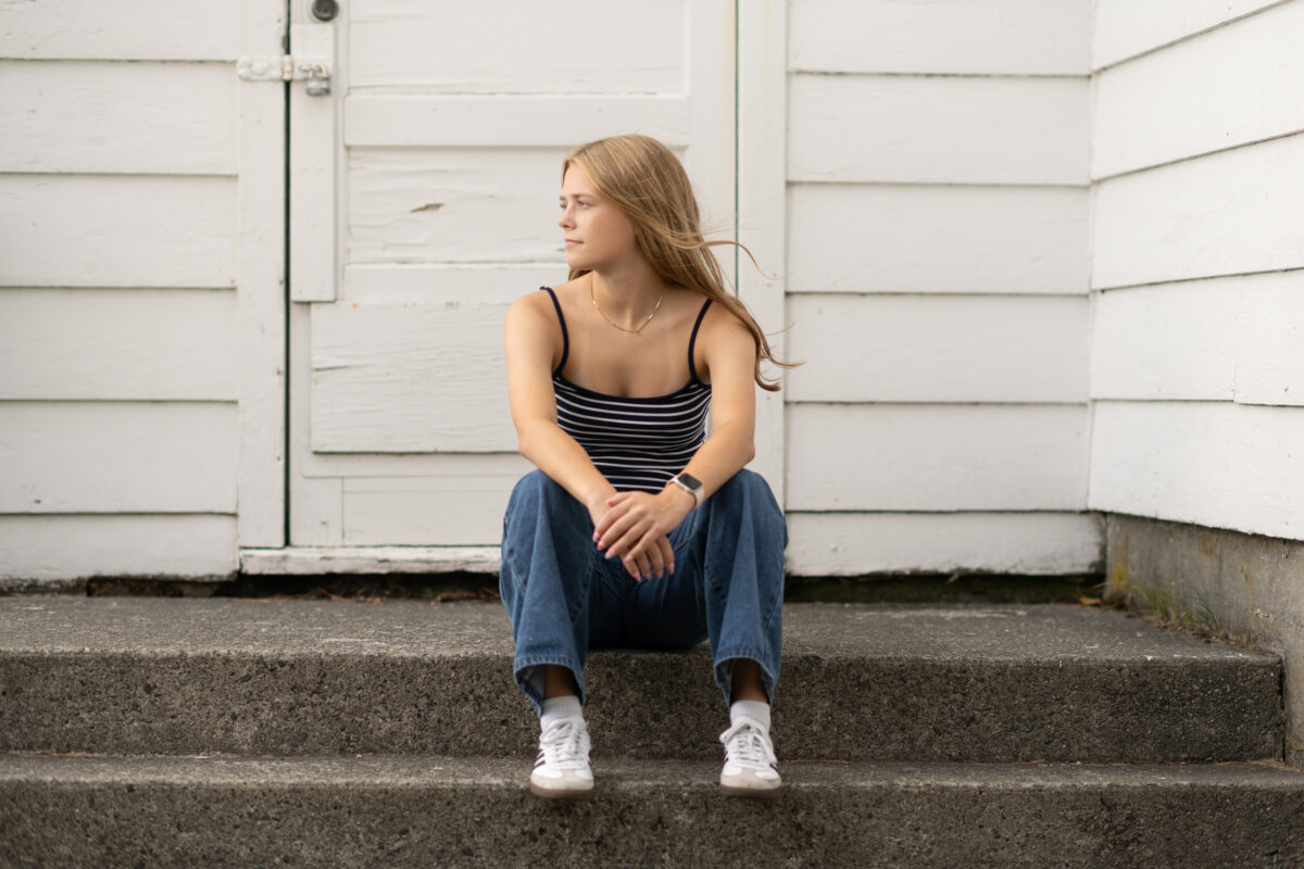 outdoor senior sitting on steps portrait of high school senior girl published by Lara Grauer Photography