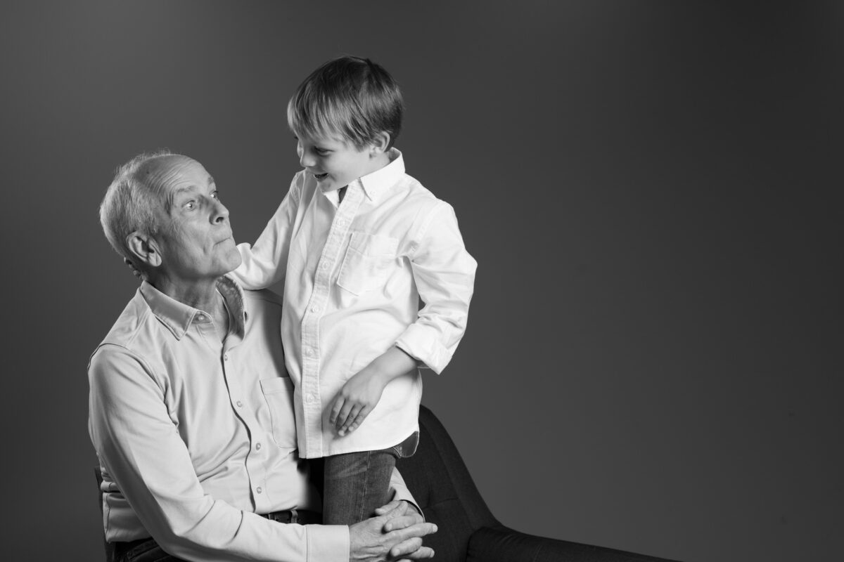 Young boy with his grandfather, portrait from Lara Grauer Photography "Generations" project