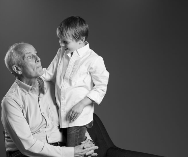 Young boy with his grandfather, portrait from Lara Grauer Photography "Generations" project